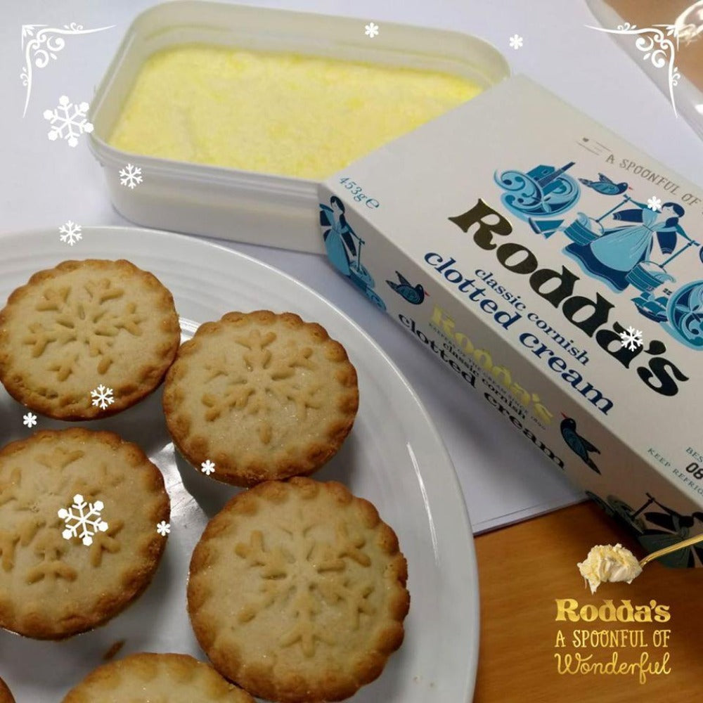 Display of clotted cream with scones on plate